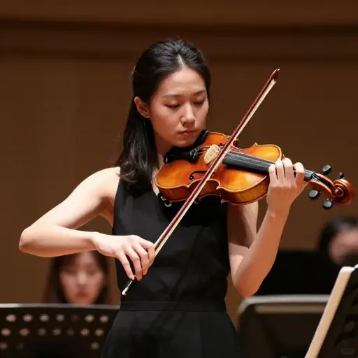 她出色地演奏了小提琴曲。