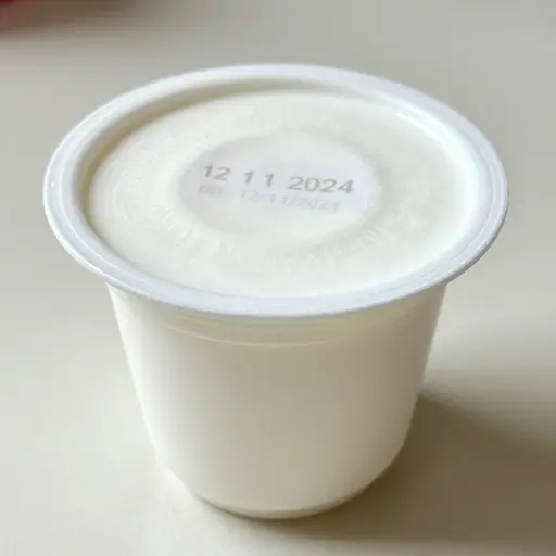 这酸奶已经过了最佳食用日期。