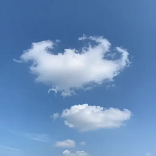 一阵微风使云朵飘过天空。