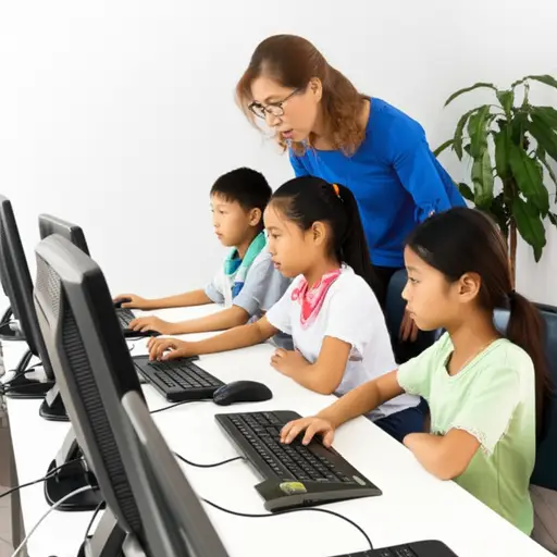 孩子们在学校学习使用电脑。